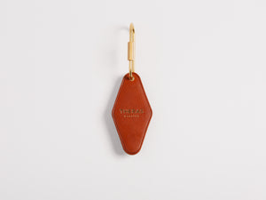 
                  
                    Load image into Gallery viewer, Vintage Leather Hotel Key with Brass Oval Key Ring, Standard, Personalized, Theras Atelier, Made to Order Leather Goods, Custom Hotel Key Chain - 2
                  
                