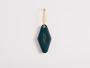 
                  
                    Load image into Gallery viewer, Vintage Leather Hotel Key with Brass Oval Key Ring, Standard, Personalized, Theras Atelier, Made to Order Leather Goods, Custom Hotel Key Chain - 5
                  
                