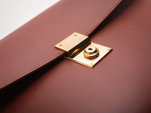 
                  
                    Load image into Gallery viewer, Men&amp;#39;s Leather Clutch with Brass Lock
                  
                