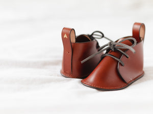 
                  
                    Load image into Gallery viewer, Hand Crafted Heirloom Leather Baby Shoes
                  
                